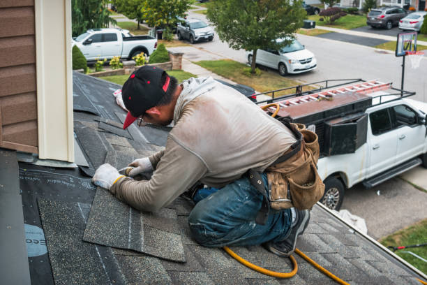 Professional Roofing technician working in Wilson, WY